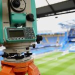 Laser theodolite measuring Chelsea Stadium in London